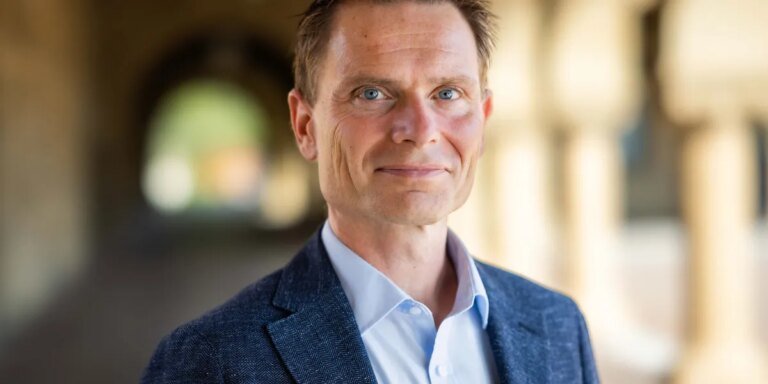 Stanford hybrid work expert says World Cup chaos and gas prices are making this a remote work summer