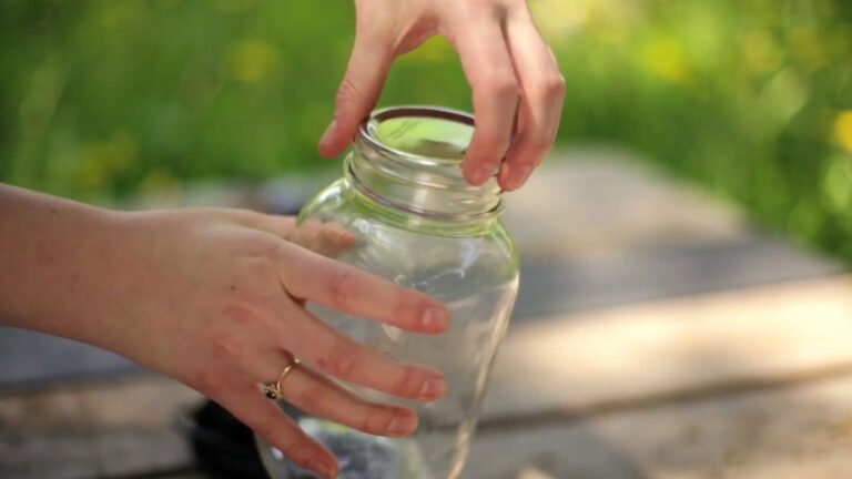 Turn Old Pickle Jars Into Stylish Patio Lanterns With This Clever Upcycle