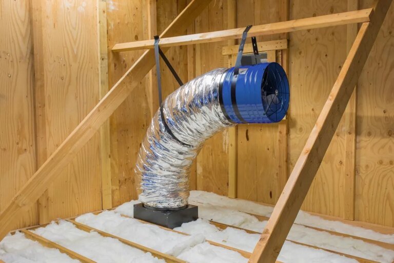 Who Installs Attic Fans? Should You Hire a Roofer, an HVAC Pro, or an Electrician?