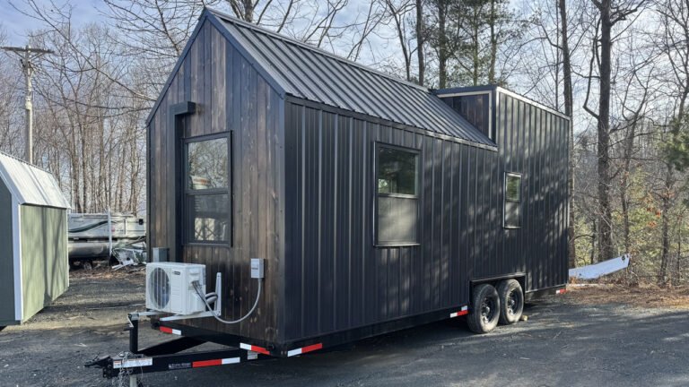 $55,000 Black Timber Tiny House Sleeps Two in 24 ft. Layout