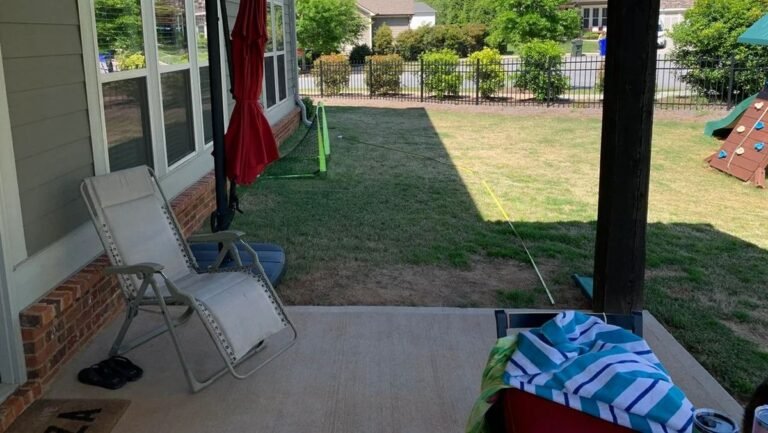 Family Screened In Their Open Porch and Extended the Space With a Curved Flagstone Patio
