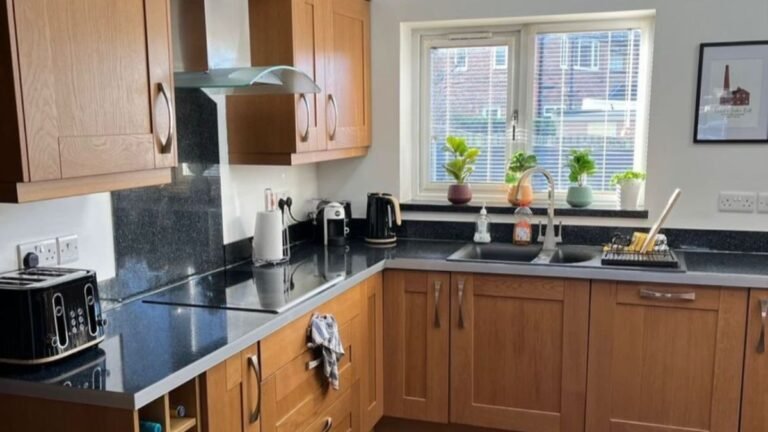 He Spray Painted the Oak Cabinets Stiffkey Blue and They Look Like a Different Kitchen