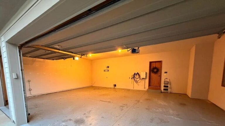 This Bare Garage Became a Workshop With Tool Storage, a TV, and Retro Lighting