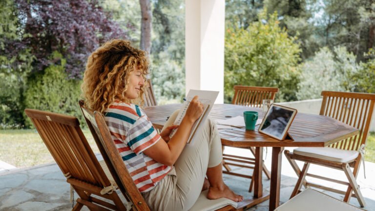 10 Unexpected Items You Can Upcycle Into A Charming Backyard Privacy Screen