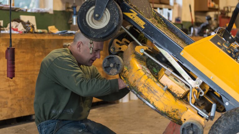Forget The WD-40? A Quick Trick To Remove Grass Clippings From Your Lawn Mower Deck